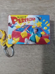 Perfection The Game Keychain 2000 FUN Milton Bradley Mini A Few Pieces Missing
