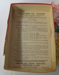 The Game of “Cootie” partial set w/ lots of additional pieces & box dated 1949