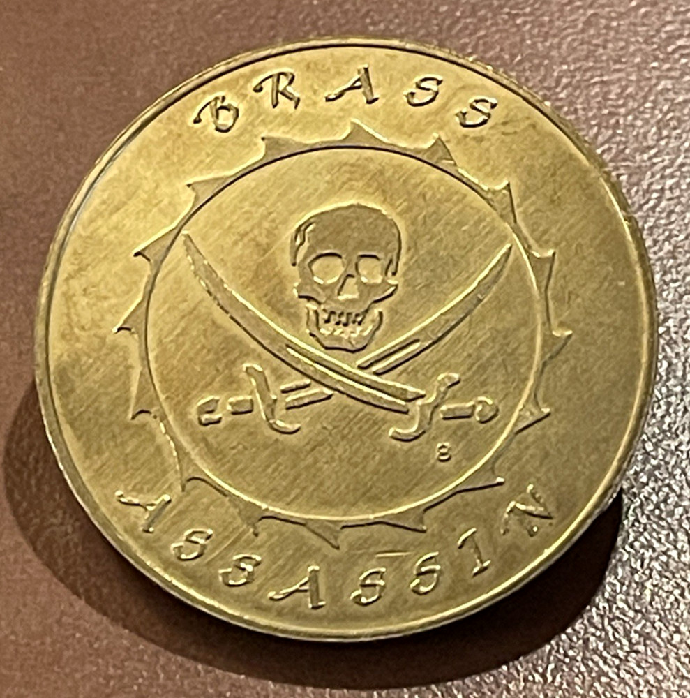 1990’s Limited Edition Brass Assassin Revenge POG Slammer Skull Crossed Swords