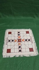 Brandubh (Irish version of Hnefatafl), canvas gameboard with glass game pcs.