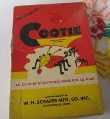 The Game of “Cootie” partial set w/ lots of additional pieces & box dated 1949