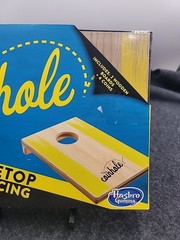 Coinhole Game The Tabletop Coin Bouncing Party Game by Hasbro Gaming