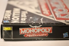 Monopoly: Millionaire Edition Board Game – First to a Million Wins Luxury Theme