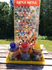Vintage RATTLE BATTLE and small Jars with tops plastic DISPLAY with MARBLES!