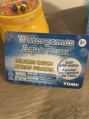 TOMY Water Games — Dolphin Ring Toss and Pelican Ball Basket Catch Toys – NEW