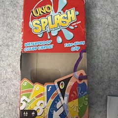 UNO Splash Card Game with Waterproof Cards and Portable Clip for Travel, Camp…