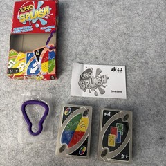 UNO Splash Card Game with Waterproof Cards and Portable Clip for Travel, Camp…