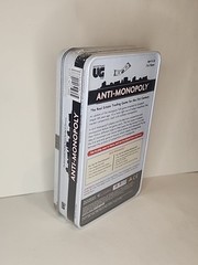 New – University Games Anti-Monopoly Game Travel Tin – Ages 8+ | 2-6 players