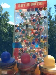 Vintage RATTLE BATTLE and small Jars with tops plastic DISPLAY with MARBLES!