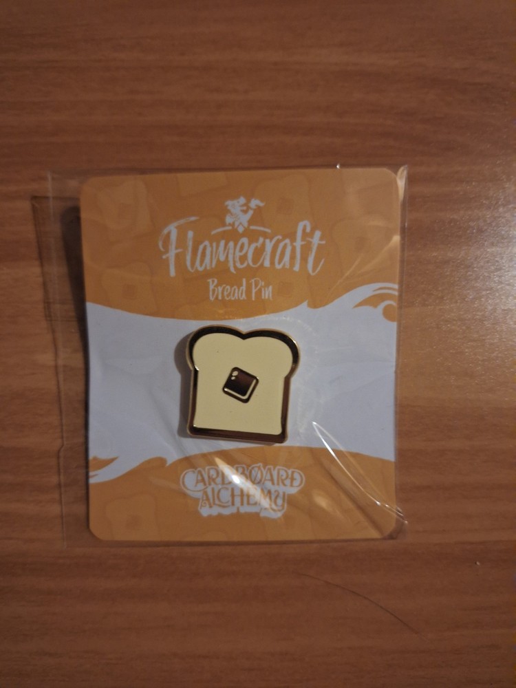 Flamecraft Bread Token Enamel Pin Cardboard Alchemy