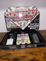 Hasbro Monopoly Millionaire Board Game Ages 8 and above Max of 4 players