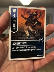 Unmatched Foil Promo Card – Achilles Heel – Restoration Games – Brand new