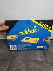 Coinhole Game The Tabletop Coin Bouncing Party Game by Hasbro Gaming