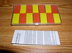 VINTAGE 28-PIECE MULTI-COLOR DOMINOES COMPACT SET IN PLASTIC CASE