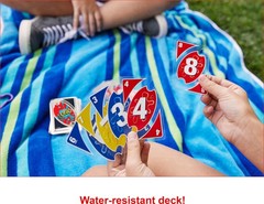 UNO Splash Card Game with Waterproof Cards and Portable Clip for Travel, Camp…