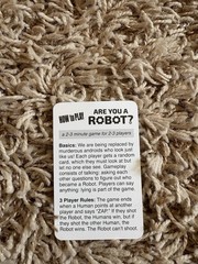 Are You a Robot? A Social Deduction Micro-Game 2-3 Players By Looney Labs