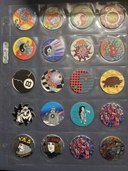 Collection Of Pogs And Slammers 335 Pogs And Slammers – 21 Plastic 9 Metal Slamm