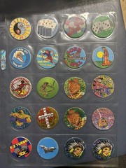 Collection Of Pogs And Slammers 335 Pogs And Slammers – 21 Plastic 9 Metal Slamm