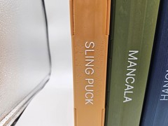 Sling Puck: The Ultimate Fast-Action Book Game