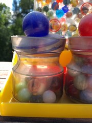 Vintage RATTLE BATTLE and small Jars with tops plastic DISPLAY with MARBLES!