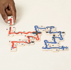 Uncommon Goods x Snakes of Wrath Tile-Laying Game