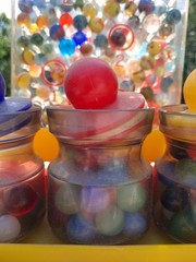 Vintage RATTLE BATTLE and small Jars with tops plastic DISPLAY with MARBLES!