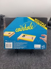 Coinhole Game The Tabletop Coin Bouncing Party Game by Hasbro Gaming