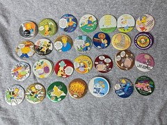 The Simpsons Pickers Lot Of 102 Pogs Tazos Magic Box 2005 Espanol / Ingles