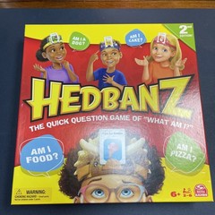 Spin Master Games, Hedbanz 2023 Edition with New Cards, Picture Guessing Board