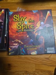 Slay the Spire The Board Game Collector’s Edition Open Box With Metal Coins