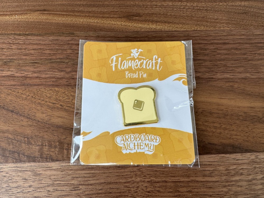 Flamecraft Bread Pin – PAX Unplugged 2025 – Cardboard Alchemy