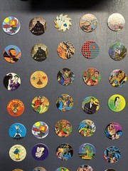 Collection Of Pogs And Slammers 335 Pogs And Slammers – 21 Plastic 9 Metal Slamm