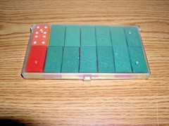 VINTAGE 28-PIECE MULTI-COLOR DOMINOES COMPACT SET IN PLASTIC CASE