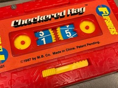 FLIPSIDERS Checkered Flag Milton Bradley 1987 Pocket Game Cassette