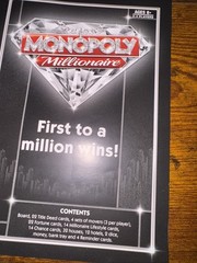 Hasbro Monopoly Millionaire Board Game Ages 8 and above Max of 4 players