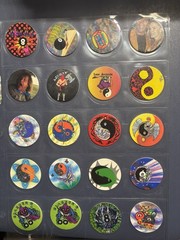 Collection Of Pogs And Slammers 335 Pogs And Slammers – 21 Plastic 9 Metal Slamm