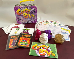 Vintage 1996 Gogo’s Crazy Bones Metal Lunchbox w/Various Game Pieces & Stickers