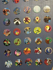 Collection Of Pogs And Slammers 335 Pogs And Slammers – 21 Plastic 9 Metal Slamm