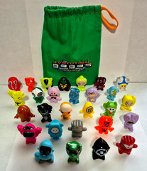 28 Gogo’s Crazy Bones in Evolution Green Bag