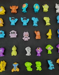 Gogos Crazy Bones Series 1 Lot of 44 Figures with Two Plastic Cases