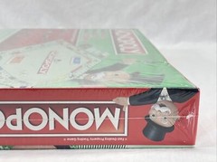 MONOPOLY GAME-16 TOKENS THROUGH THE YEARS EDITION – READ