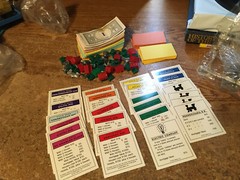 LOT OF BOARD GAME PIECES MONOPOLY CHICAGO IN A BOX CAREERS LOTS OF SILVER PIECES