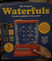 Original Waterfuls Classic Handheld Water Game – 6 Interchangeable Back Panels