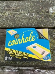 Hasbro Coinhole Game Tabletop Coin Bouncing Cornhole Party Quarter Drinking Game