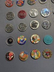Collection Of Pogs And Slammers 335 Pogs And Slammers – 21 Plastic 9 Metal Slamm