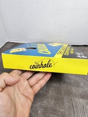 Coinhole Game The Tabletop Coin Bouncing Party Game by Hasbro Gaming
