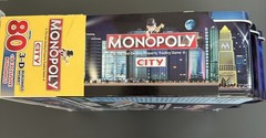 MONOPOLY CITY Metal TIN Box Edition Game 2009 New in Box. Never Played