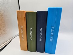Sling Puck: The Ultimate Fast-Action Book Game