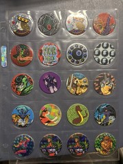 Collection Of Pogs And Slammers 335 Pogs And Slammers – 21 Plastic 9 Metal Slamm