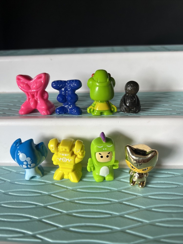 Lot of 8 Gogos Crazy Bones Various Colors/Seasons